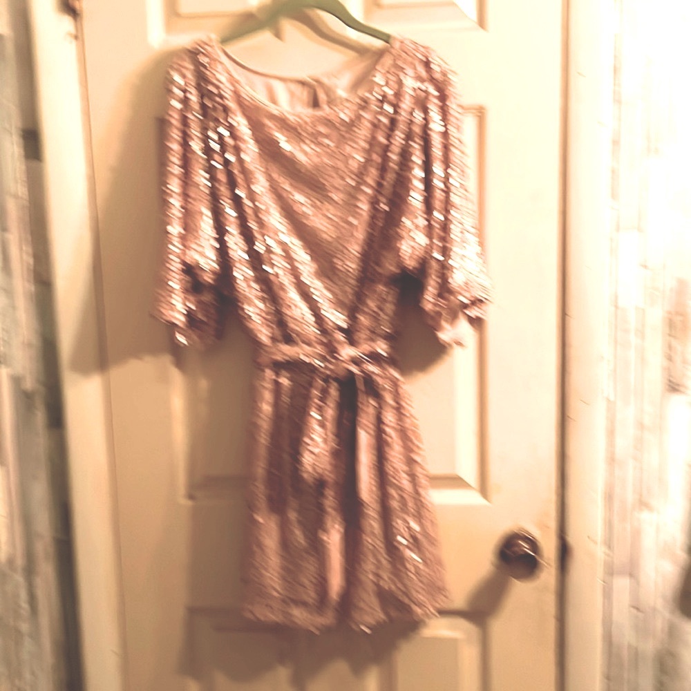 Jessica Simpson dress size L , taupe color, worn once, great condition .